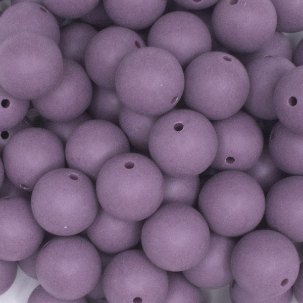 close up view of a pile of 16mm Purple Matte Solid Chunky Bubblegum Beads