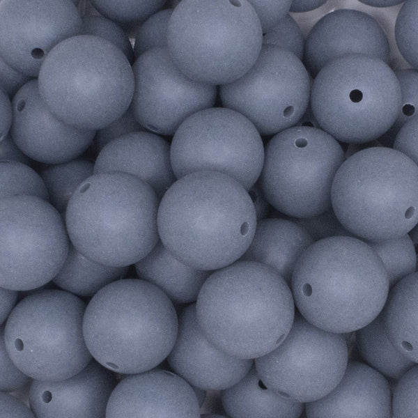 close up view of a pile of 16mm Seel Blue Matte Solid Chunky Bubblegum Beads