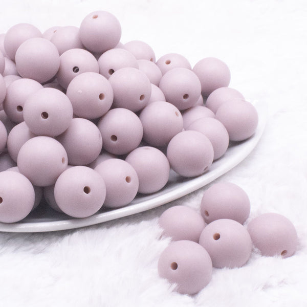 front view of a pile of 16mm Taupe Matte Solid Chunky Bubblegum Beads
