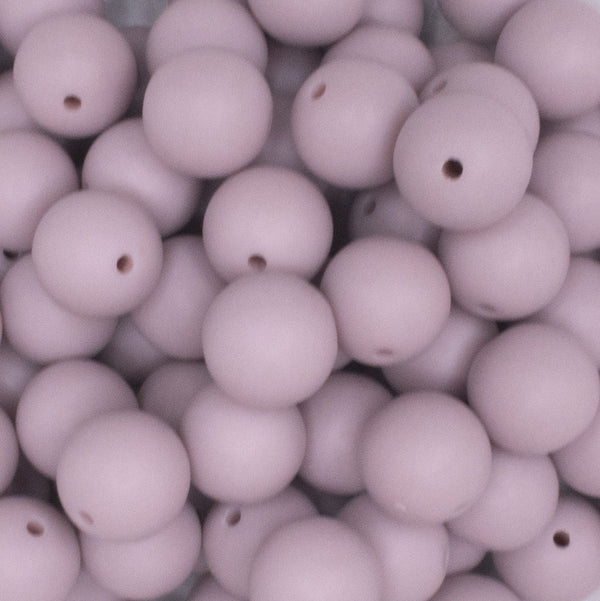 close up view of a pile of 16mm Taupe Matte Solid Chunky Bubblegum Beads
