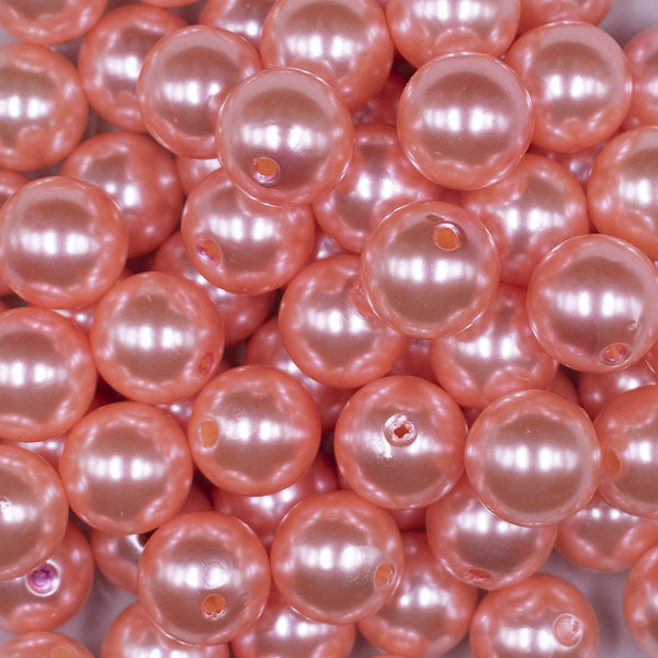 Close up view of a pile of 16mm Melon Orange Faux Pearl Acrylic Bubblegum Jewelry Beads