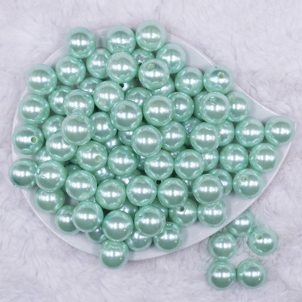 Top view of a pile of 16mm Mint Green Faux Pearl Acrylic Bubblegum Jewelry Beads