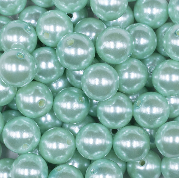 Close up view of a pile of 16mm Mint Green Faux Pearl Acrylic Bubblegum Jewelry Beads