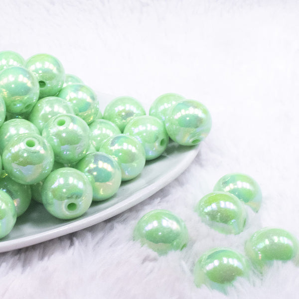 front view of a pile of 16mm Mint Green Solid AB Bubblegum Beads