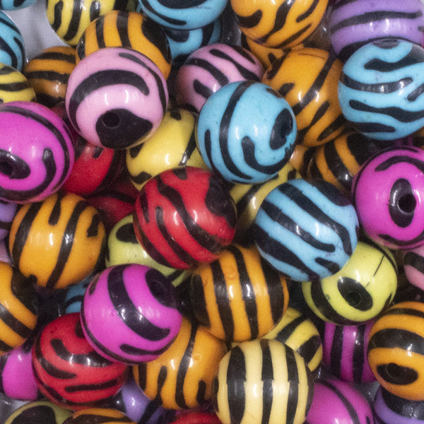 close up view of a pile of 16mm Zebra Print Acrylic Bubblegum Jewelry Beads