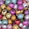 close up view of a pile of 16mm Stardust Mix Acrylic Bubblegum Beads Bulk - 100 Count