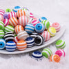 front view of a pile of 16mm Striped Mix Acrylic Bubblegum Beads Bulk - 100 Count