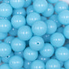 Close up view of a pile of 16mm Blue Neon Solid Acrylic Bubblegum Jewelry Beads