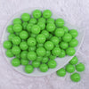 top view of a pile of 16mm Neon Green Solid Acrylic Bubblegum Jewelry Beads