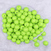 Top view of a pile of 116mm Neon Lime Solid Acrylic Bubblegum Jewelry Beads
