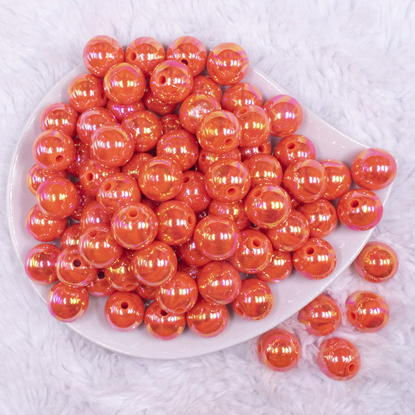 top view of a pile of  16mm Neon Orange Solid AB Bubblegum Beads