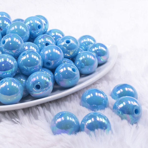 front view of a pile of 16mm Ocean Blue Solid AB Bubblegum Beads