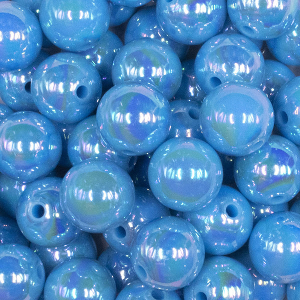 close up view of a pile of 16mm Ocean Blue Solid AB Bubblegum Beads