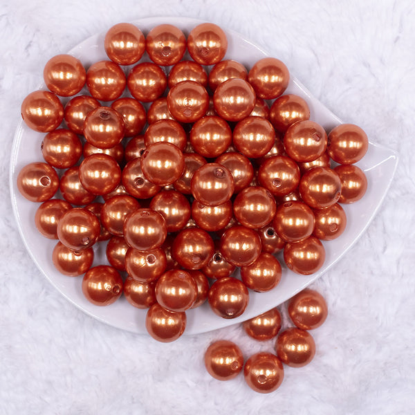 Top view of a pile of 16mm Orange Faux Pearl Acrylic Bubblegum Jewelry Beads