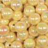 close up view of a pile of 16mm Pastel Yellow Solid AB Bubblegum Beads