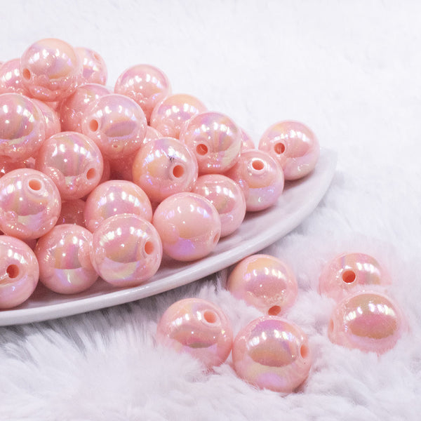 front view of a pile of 16mm Peach Solid AB Bubblegum Beads