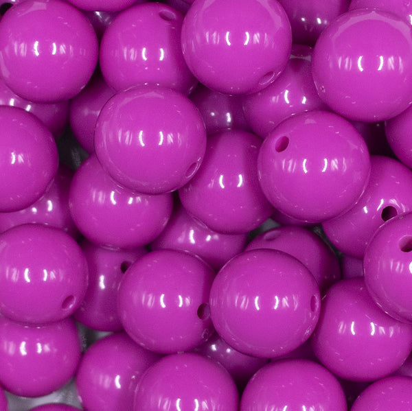 Close up view of a pile of 16mm Peony Pink Solid Acrylic Bubblegum Jewelry Beads