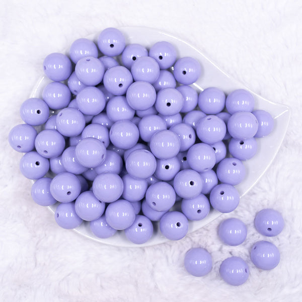 Top view of a pile of 16mm Periwinkle Purple Solid Acrylic Bubblegum Jewelry Beads