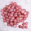 top view of a pile of 16mm Pink Galaxy Sparkle Resin Bubblegum Beads