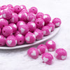 front view of a pile of 16mm Pink with White Hearts Bubblegum Beads