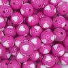 close up view of a pile of 16mm Pink with White Hearts Bubblegum Beads