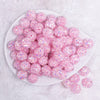 top view of a pile of 16mm Pink Majestic Confetti Bubblegum Beads