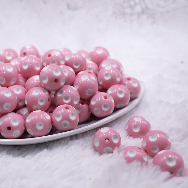 Front view of a pile of 16mm Pink with White Polka Dots Bubblegum Beads