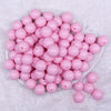 top view of a pile of 16mm Pink Solid Acrylic Bubblegum Jewelry Beads