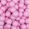 close up view of a pile of 16mm Pink Solid Acrylic Bubblegum Jewelry Beads