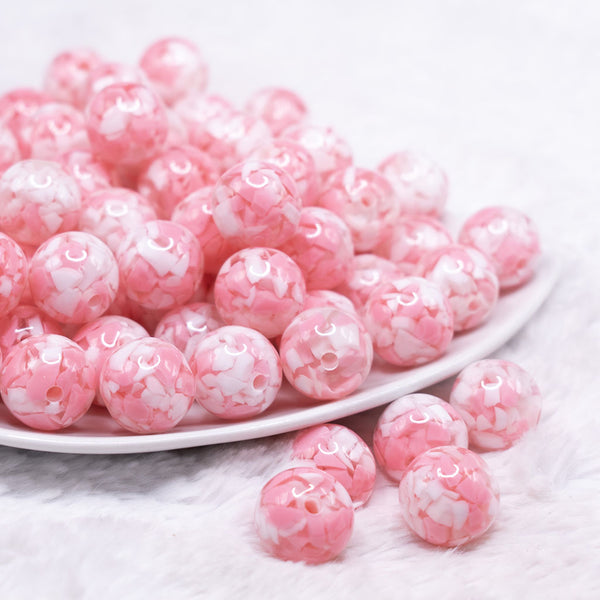 front view of a pile of 16mm Pink Tablet Acrylic Bubblegum Beads