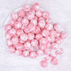 top view of a pile of 16mm Pink Tablet Acrylic Bubblegum Beads