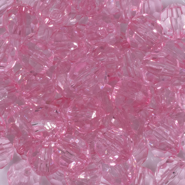 close up view of a pile of 20mm Pink Transparent Faceted Bubblegum Beads