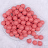 top view of a pile of 16mm Punch Pink Solid Acrylic Bubblegum Jewelry Beads