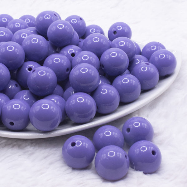 front view of a pile of 16mm Purple Solid Acrylic Bubblegum Jewelry Beads