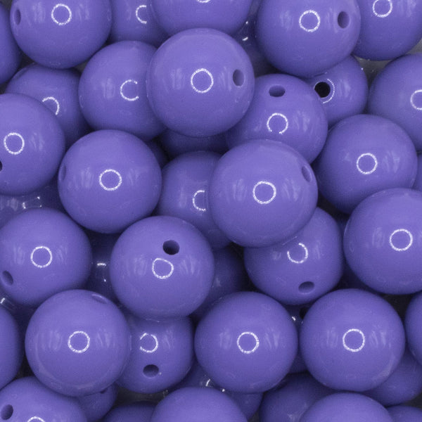 close up view of a pile of 16mm Purple Solid Acrylic Bubblegum Jewelry Beads