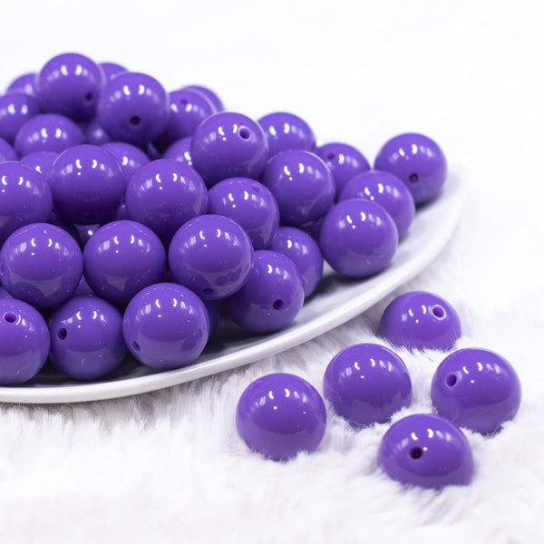 Front view of a pile of 16mm Purple Passion Solid Acrylic Bubblegum Jewelry Beads