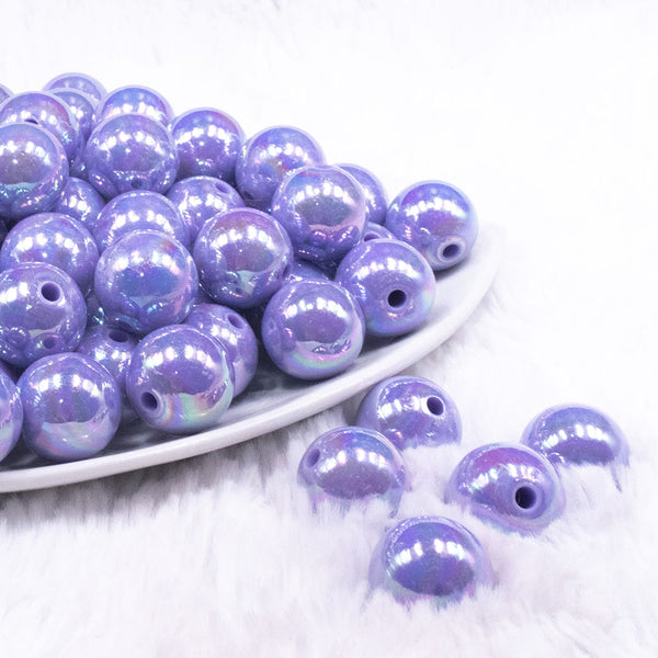 front view of a pile of 16mm Periwinkle Purple Solid AB Bubblegum Beads