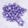 top view of a pile of 16mm Purple Tablet Acrylic Bubblegum Beads