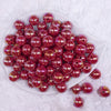 top view of a pile of 16mm Raspberry Red Solid AB Bubblegum Beads