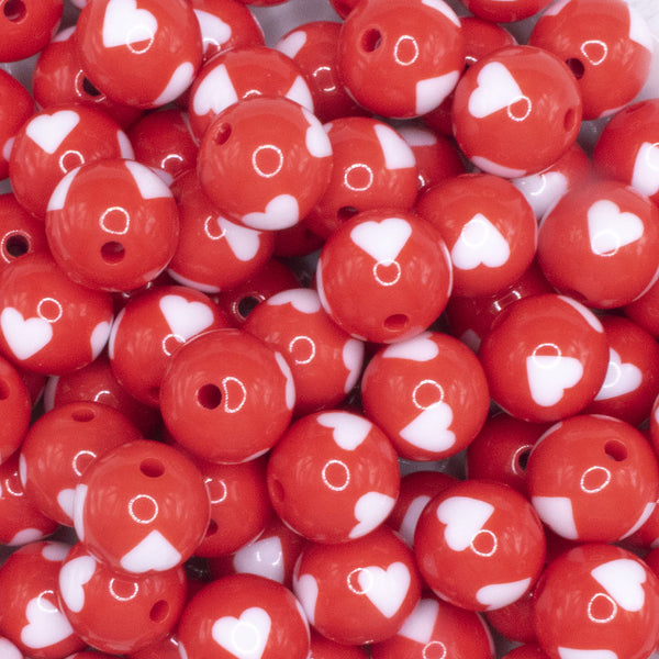 close up view of a pile of 16mm Red with White Hearts Bubblegum Beads