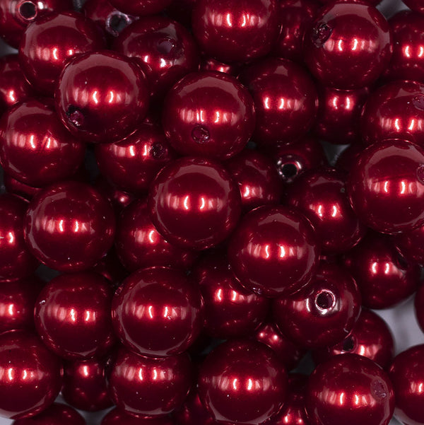 Close up view of a pile of 16mm Red Faux Pearl Acrylic Bubblegum Jewelry Beads