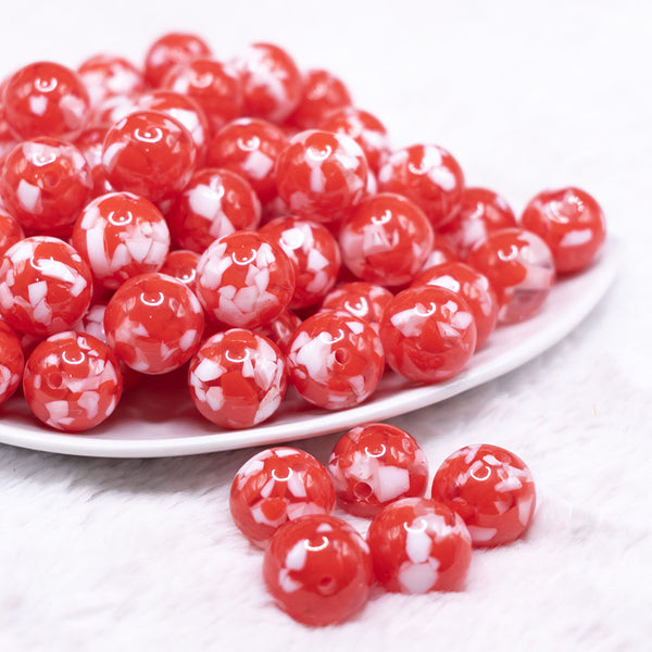 front view of a pile of 16mm Red Tablet Acrylic Bubblegum Beads