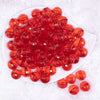 top view of a pile of 16mm Red Transparent Disco Shaped Bubblegum Beads