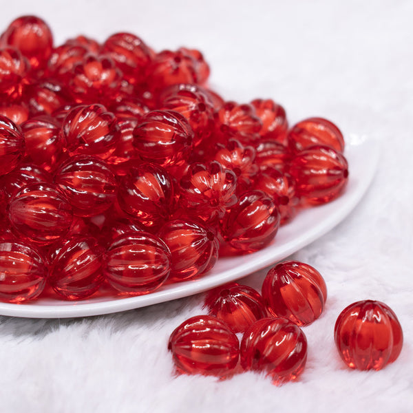 front view of a pile of 16mm Red Transparent Pumpkin Shaped Bubblegum Beads
