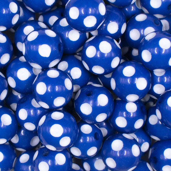 Close up view of a pile of  16mm Royal Blue with White Polka Dots Bubblegum Beads