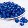 front view of a pile of 16mm Royal Blue Transparent Pumpkin Shaped Bubblegum Beads