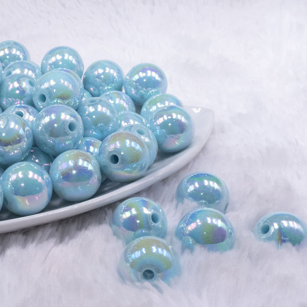 front view of a pile of 16mm Sea Blue Solid AB Bubblegum Beads