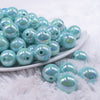 front view of a pile of 16mm Seafood Blue Solid AB Bubblegum Beads
