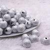 front view of a pile of 16mm Silver Stardust Acrylic Bubblegum Beads