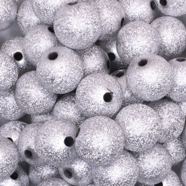 close up view of a pile of 16mm Silver Stardust Acrylic Bubblegum Beads